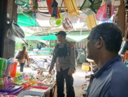 Patroli di Pasar Tengah Personil BKPM Tanjung Pura Himbau Warga Cegah Premanisme