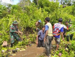 Koramil 14/Sayan Bersama Warga Dusun Senain Gelar Gotong Royong Bersihkan Irigasi