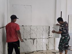 Satgas TMMD Ke-126 Kodim 1207/Pontianak Laksanakan Pemasangan Keramik