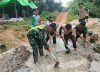 Wujud Kepedulian Kodim 1209/Bengkayang Bantu Warga Bangun Jembatan