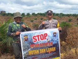 Bhabinkamtibmas Polsek Nanga Pinoh Humanis Sampaikan Himbauan Bahaya Karhutla Kepada Warga