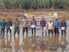 Plh Koramil 06/Selakau Hadiri Tanam Padi Perdana Di Lahan Cetak Sawah Rakyat Wilayah Binaan