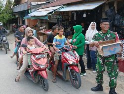 Wujud Kepedulian Sosial Koramil 1206-11/Silat Hilir Beserta Persit Kartika Candra Kirana Cabang L Kodim 1206 / Putussibau Ranting 12 Silat Hilir Berbagi Takjil Kepada Masyarakat Di Bulan Ramadhan 1447 H