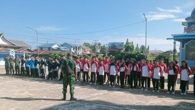 Pj. Danramil 1206-06/Putussibau Utara Pimpin Kegiatan Jumat Asri Di Kedamin Hilir