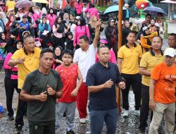 Meski Diguyur Hujan Warga Melawi Tetap Antusias Ikuti Car Free Day Dan Senam Bersama HUT Bhayangkara Ke-80