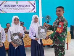 Babinsa Koramil 01/Sambas Hadiri Penyerahan Penghargaan Kepada Siswa Berprestasi Di Wilayah Binaan