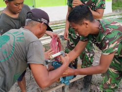 Satgas TMMD Reguler Ke-129 Pasang Slang dan Mesin Air pada Sumur Bor Program TMMD