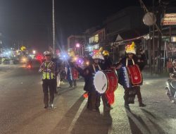 Satlantas Polres Melawi Kawal Dan Amankan Pawai HUT Ke-77 Paroki Santa Maria Nanga Pinoh